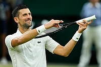 | Photo: Mosa'ab Elshamy : Djokovic celebrates after defeating Holger Rune 